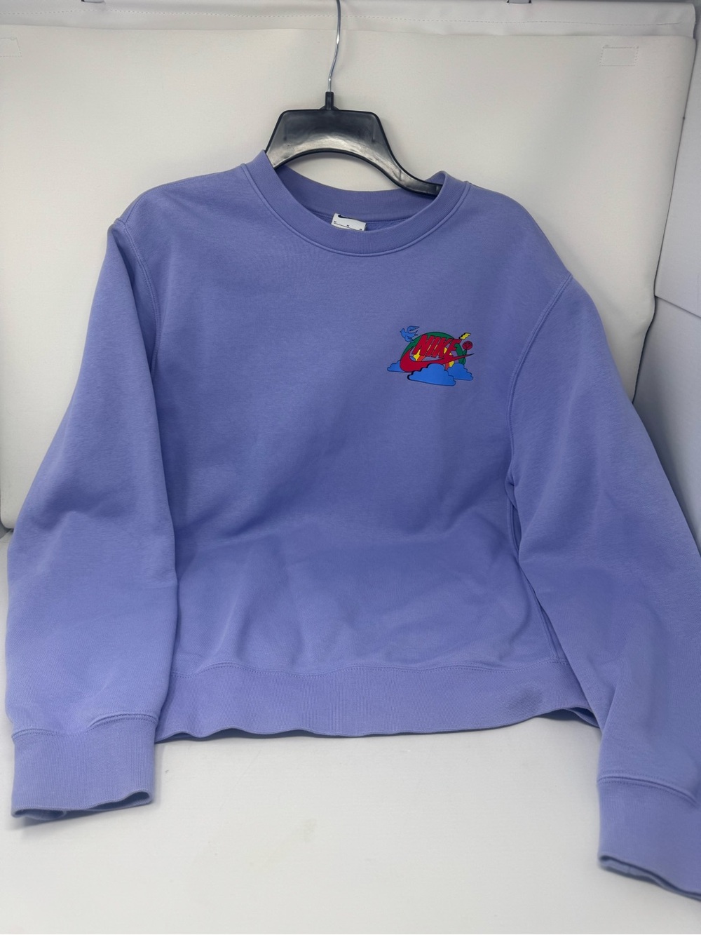 Nike women’s Lavender Crewneck Sweatshirt with Colorful Surf Graphic